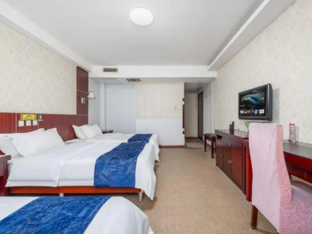 Bed in Weihai Huayu Business Hotel