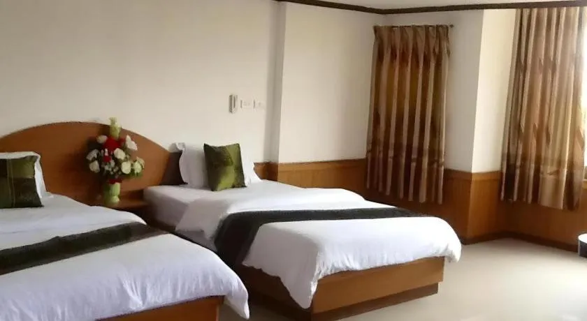 Bed in PC Palace Hotel