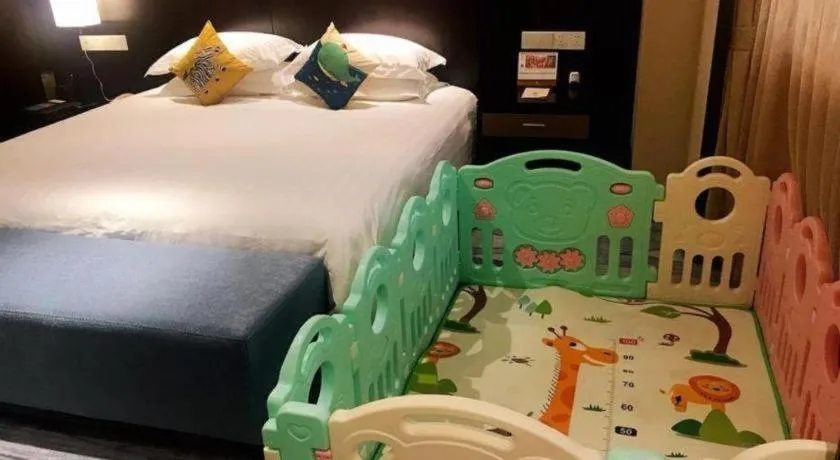 Bed in Huzhou Zhebei Hotel