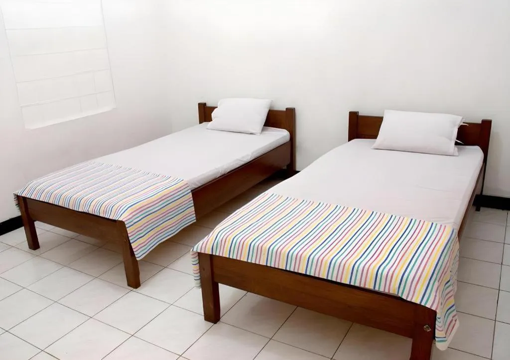 Bed in Hotel Wijaya Magelang