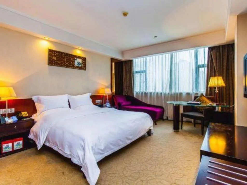 Bed in Centenio International Hotel