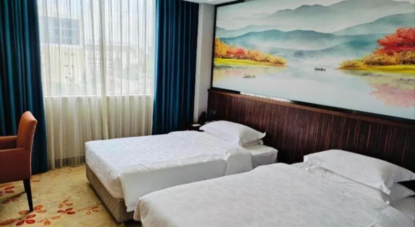 Bed in Centenio International Hotel