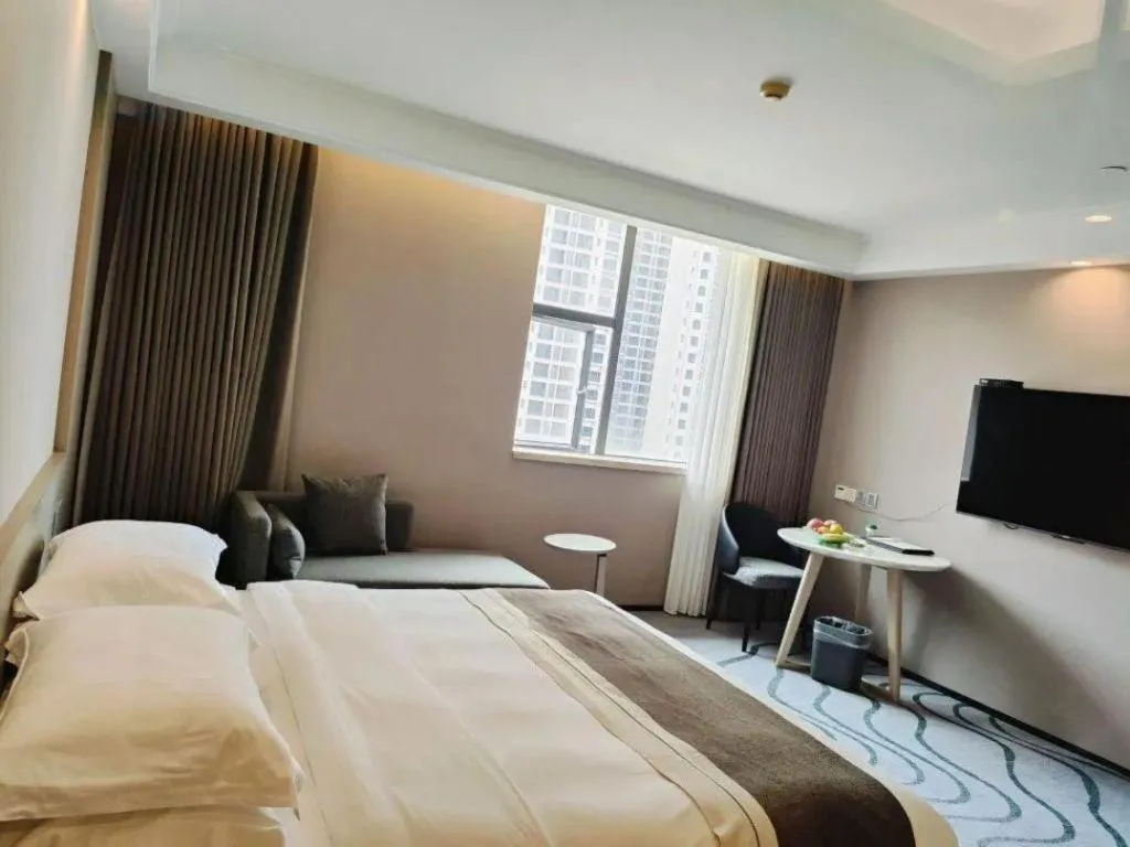 Bed in Centenio International Hotel