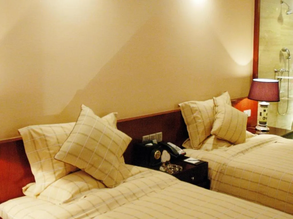 Bed in Centenio International Hotel