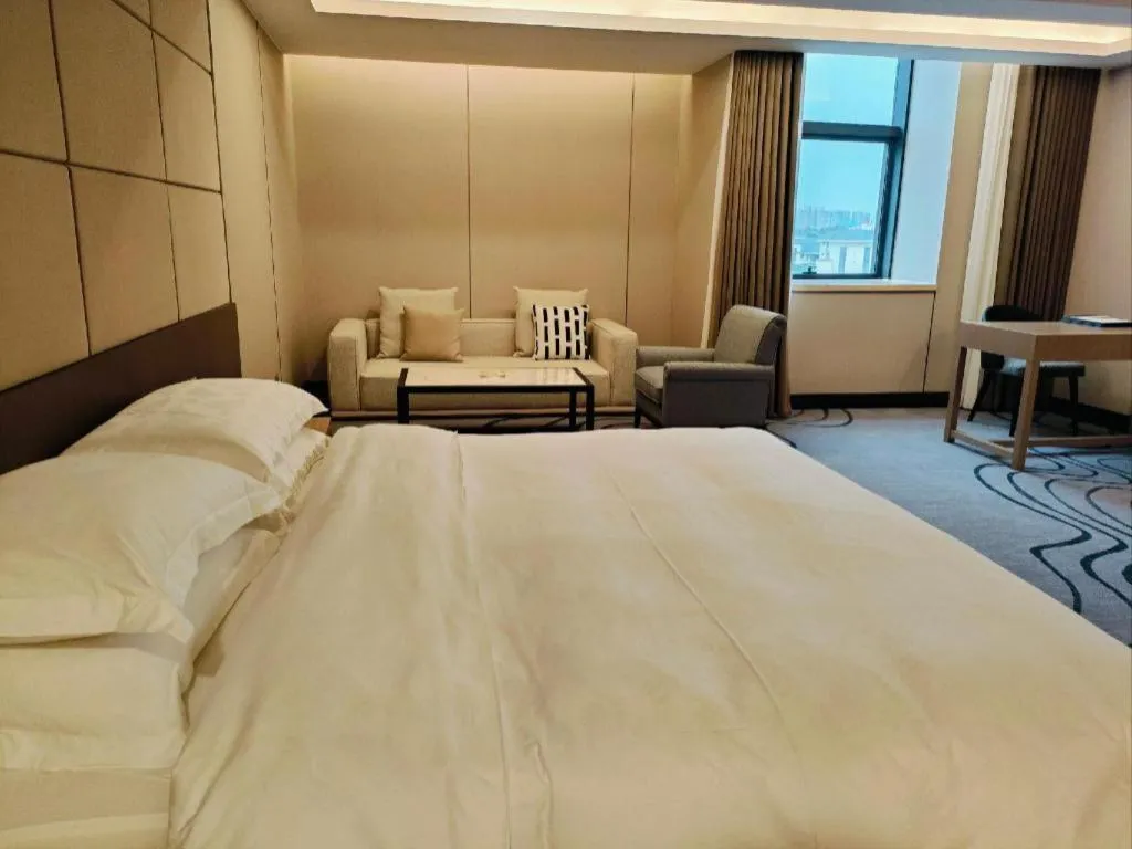 Bed in Centenio International Hotel