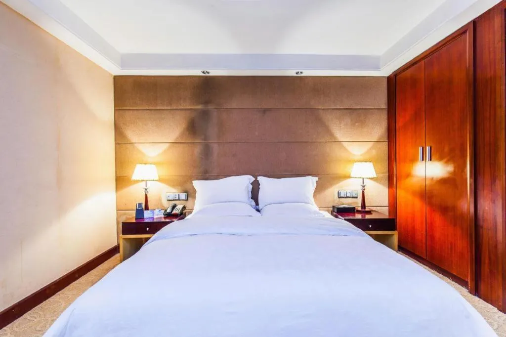 Bed in Centenio International Hotel