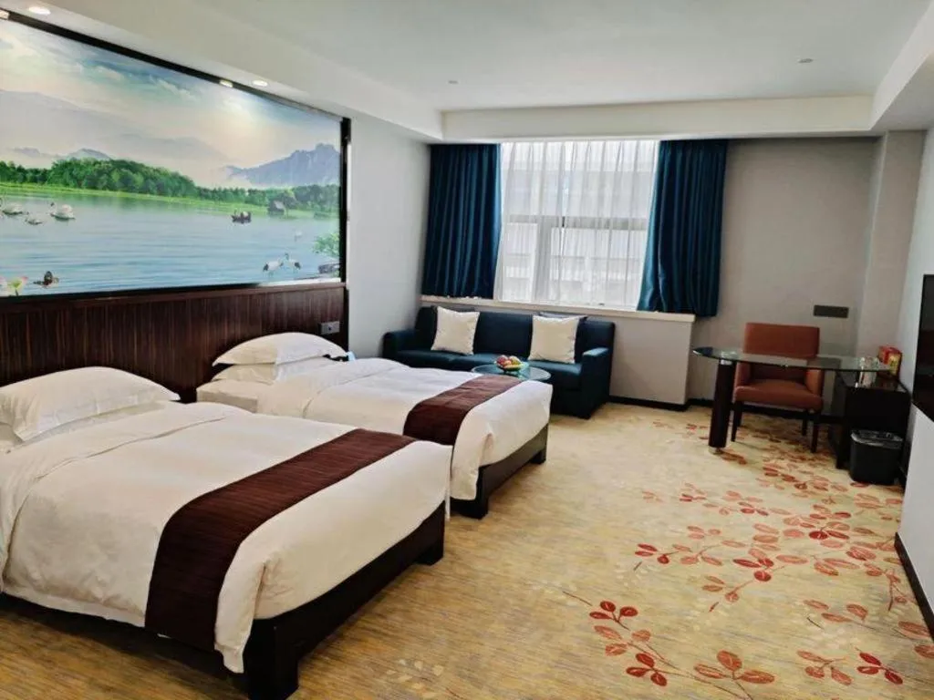 Bed in Centenio International Hotel