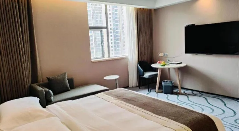 Bed in Centenio International Hotel