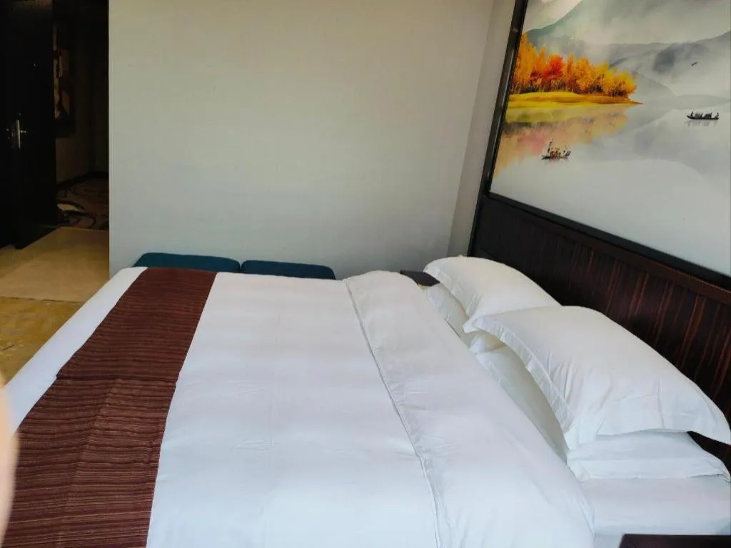 Bed in Centenio International Hotel