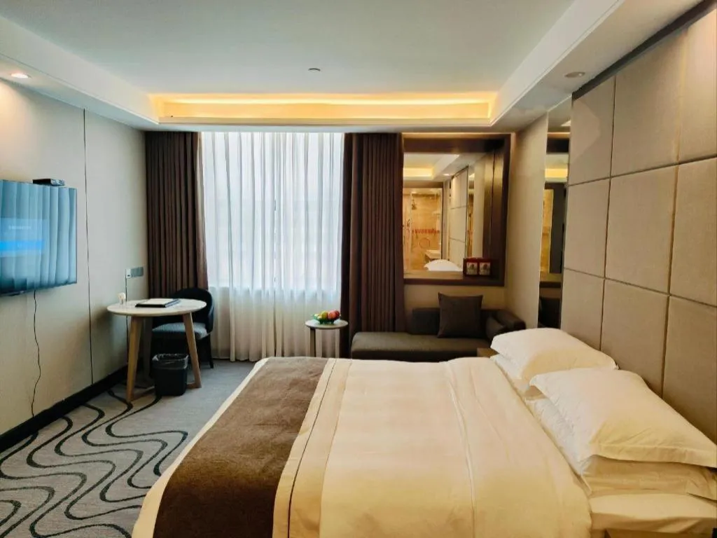 Bed in Centenio International Hotel