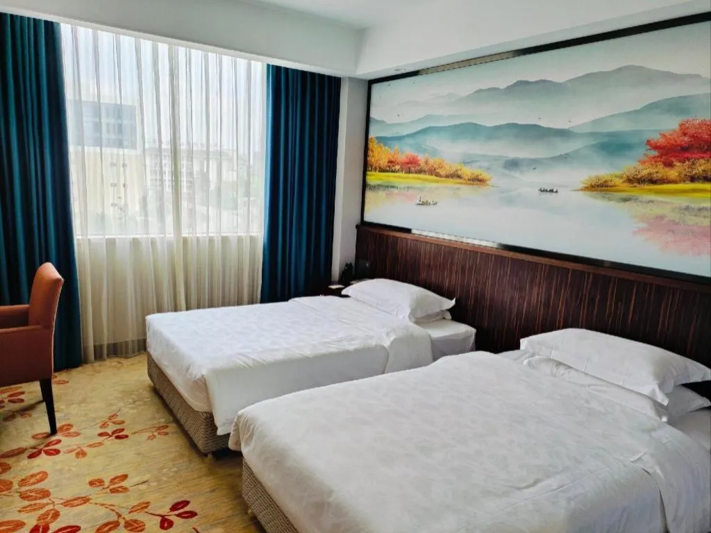 Bed in Centenio International Hotel