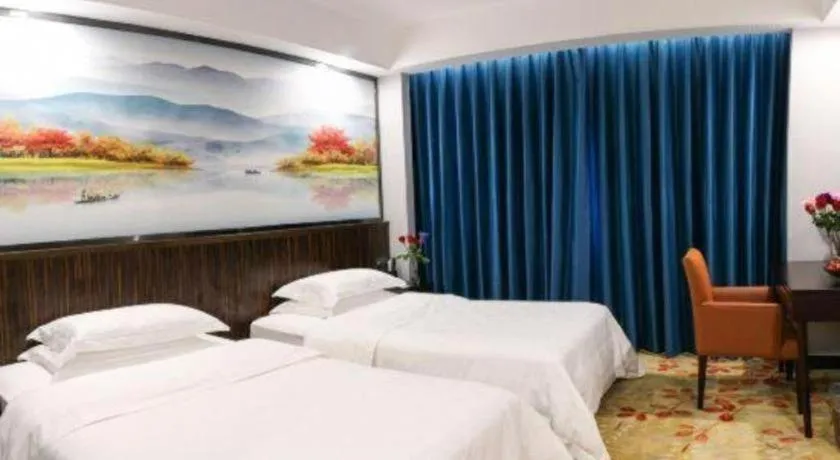 Bed in Centenio International Hotel