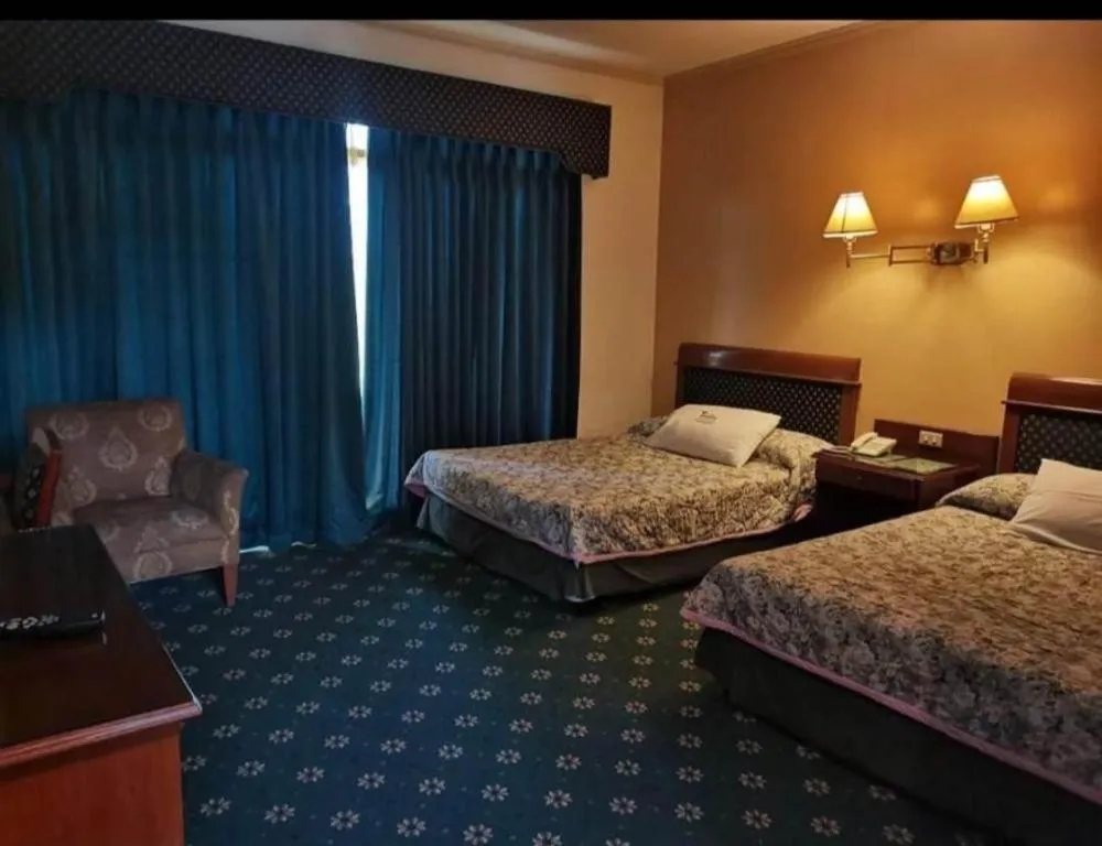 Bed in DJ Paradise Hotel