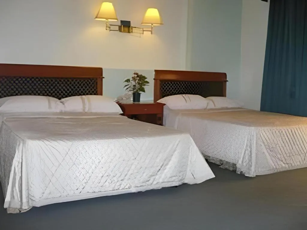 Bed in DJ Paradise Hotel