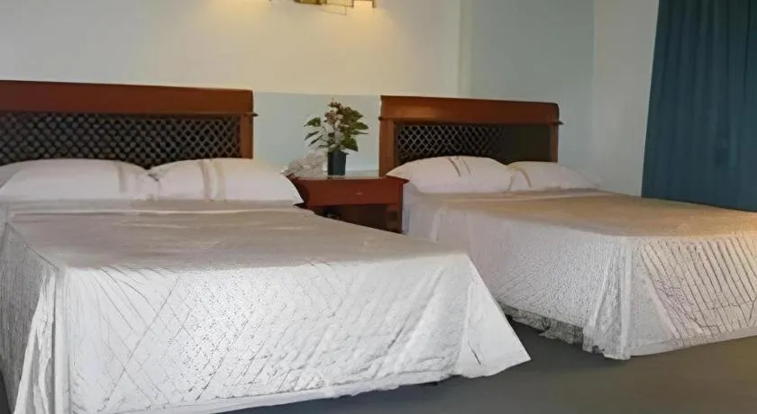Bed in DJ Paradise Hotel