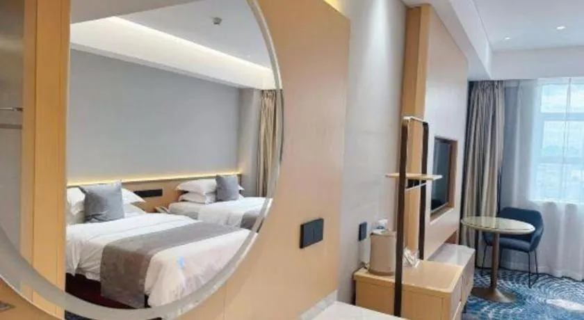 Bed in Kunming Zhong Huang Hotel