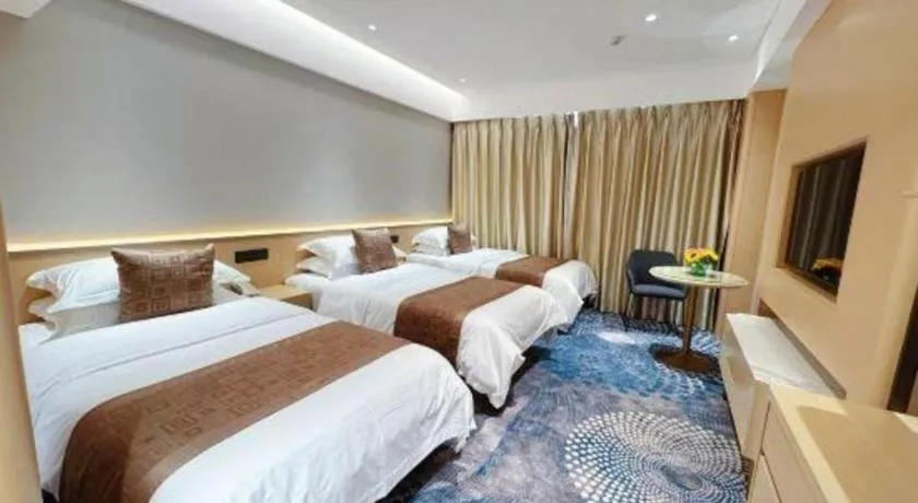 Bed in Kunming Zhong Huang Hotel