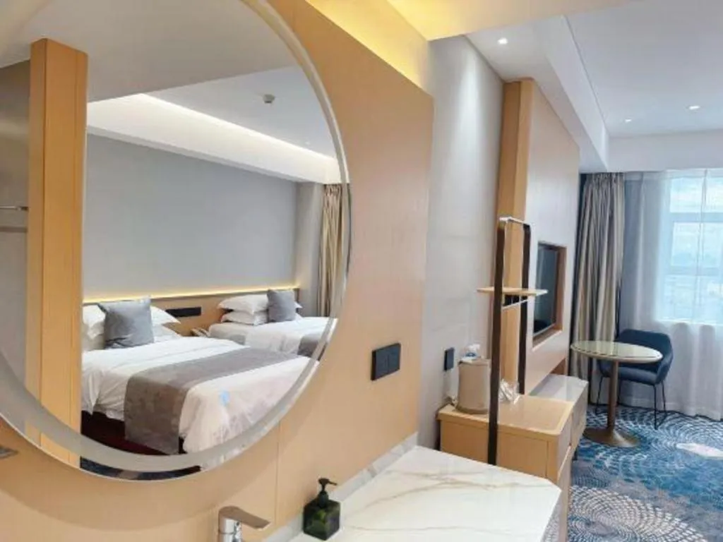 Bed in Kunming Zhong Huang Hotel