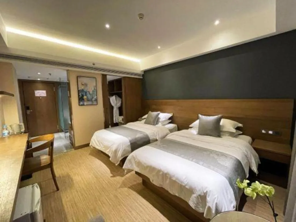 Bed in Kunming Zhong Huang Hotel