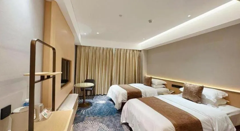 Bed in Kunming Zhong Huang Hotel