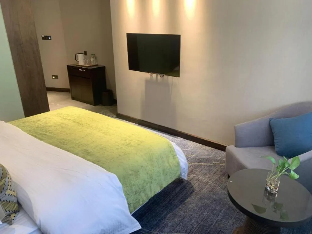 Bed in Kunming Zhong Huang Hotel