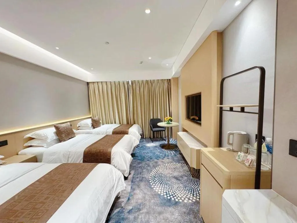 Bed in Kunming Zhong Huang Hotel