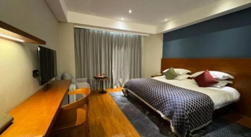 Bed in Kunming Zhong Huang Hotel