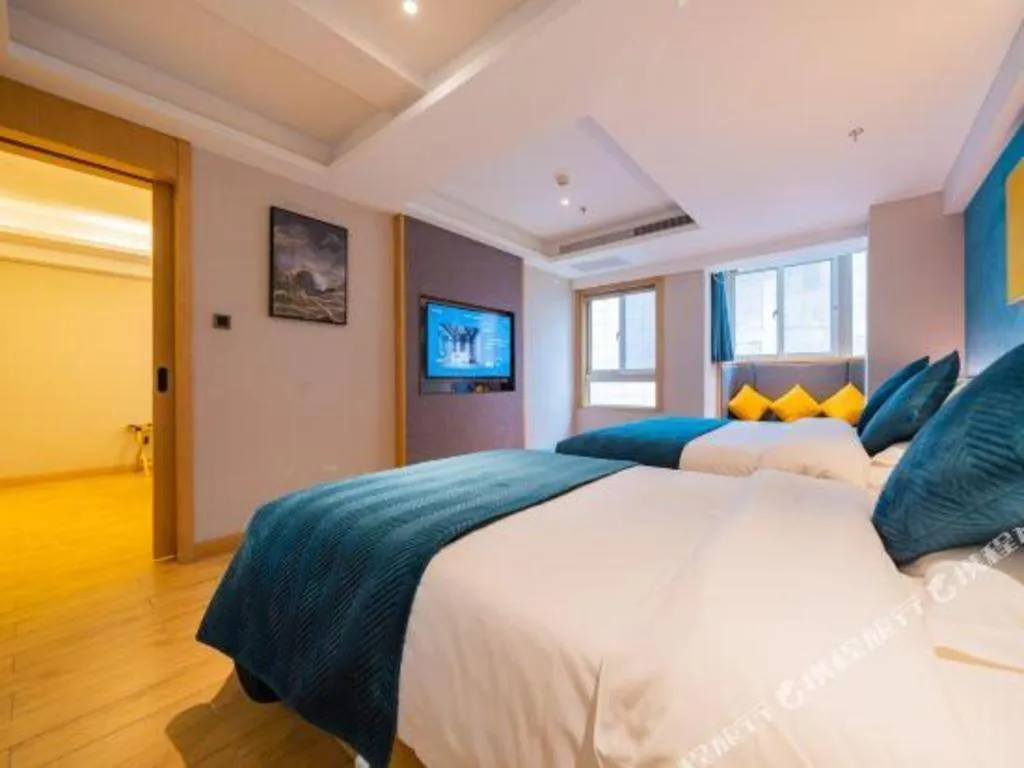 Bed in Xian Katie Eastman Hotel