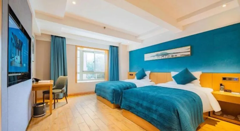 Bed in Xian Katie Eastman Hotel