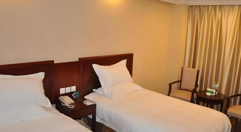 Bed in GreenTree Inn Shanghai Songjiang Xinqiao Jiuxin Road Express Hotel