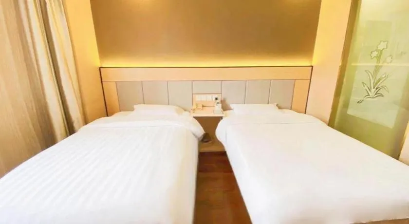Bed in GreenTree Inn Shanghai Songjiang Xinqiao Jiuxin Road Express Hotel