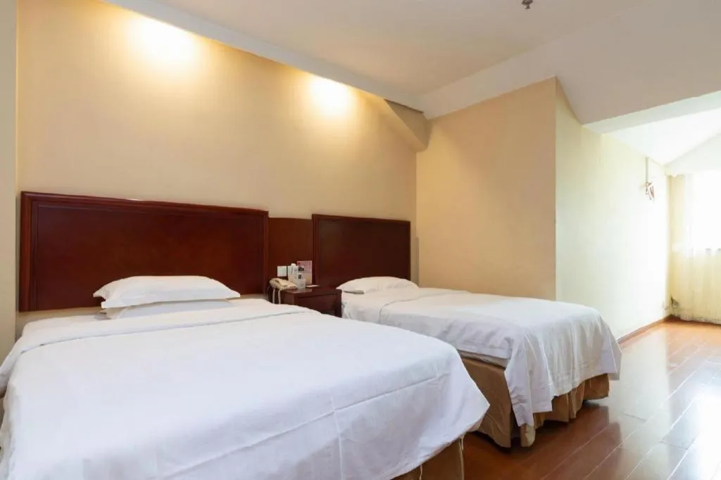 Bed in GreenTree Inn Shanghai Songjiang Xinqiao Jiuxin Road Express Hotel