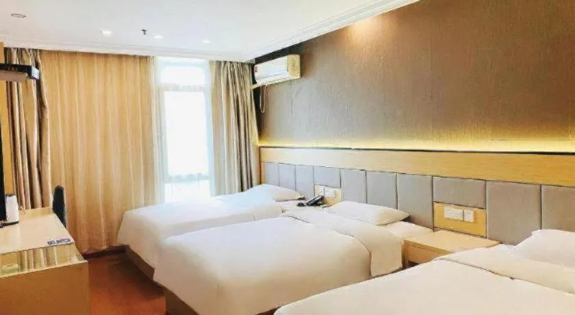 Bed in GreenTree Inn Shanghai Songjiang Xinqiao Jiuxin Road Express Hotel