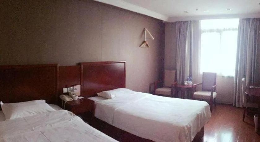 Bed in GreenTree Inn Shanghai Songjiang Xinqiao Jiuxin Road Express Hotel