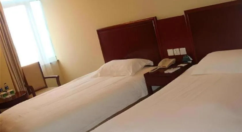 Bed in GreenTree Inn Shanghai Songjiang Xinqiao Jiuxin Road Express Hotel