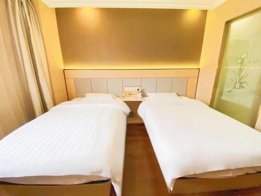 Bed in GreenTree Inn Shanghai Songjiang Xinqiao Jiuxin Road Express Hotel