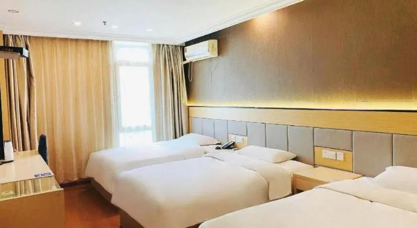 Bed in GreenTree Inn Shanghai Songjiang Xinqiao Jiuxin Road Express Hotel