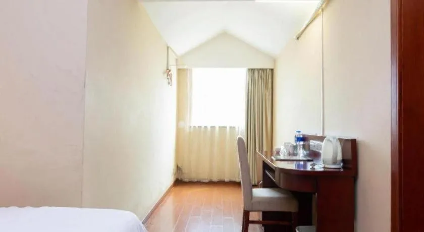 Bed in GreenTree Inn Shanghai Songjiang Xinqiao Jiuxin Road Express Hotel