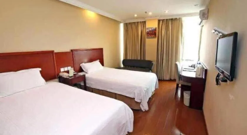 Bed in GreenTree Inn Shanghai Songjiang Xinqiao Jiuxin Road Express Hotel