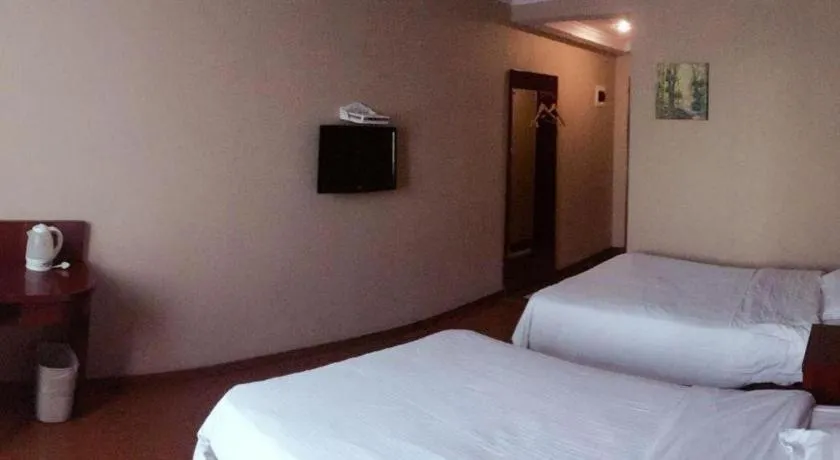 Bed in GreenTree Inn Shanghai Songjiang Xinqiao Jiuxin Road Express Hotel