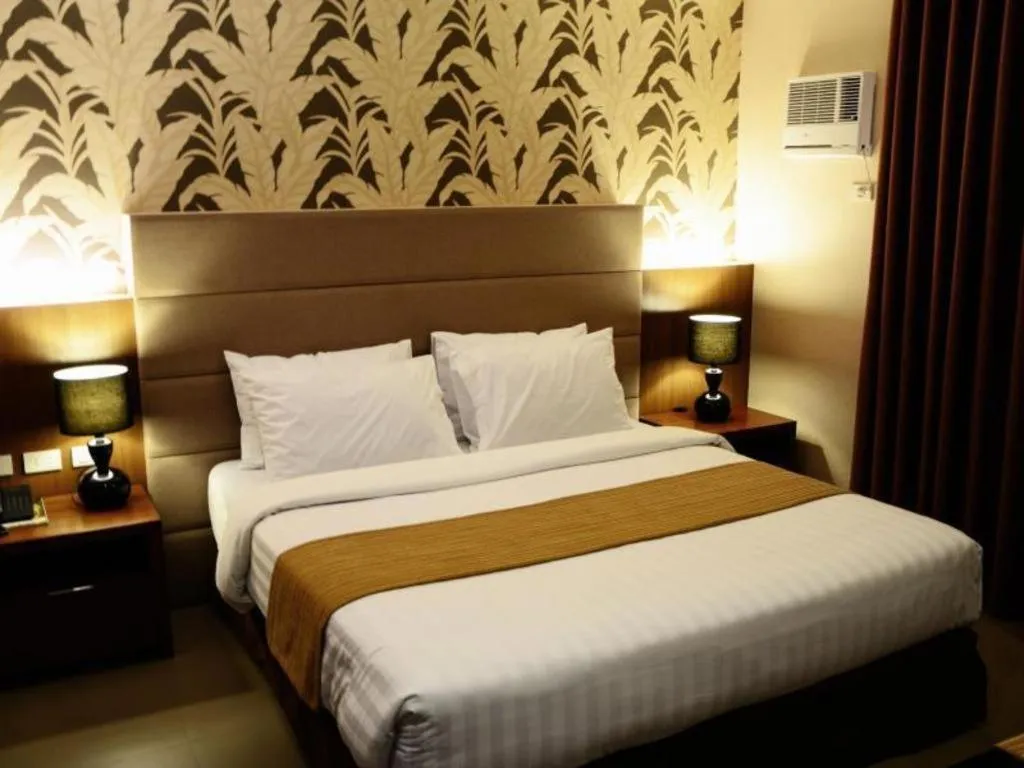 Bed in GT Hotel Bacolod