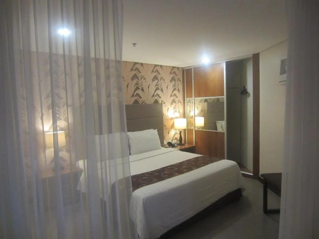 Bed in GT Hotel Bacolod
