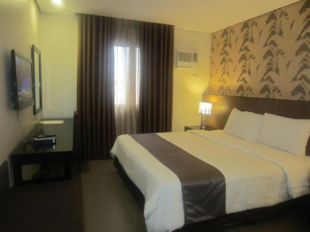 Bed in GT Hotel Bacolod