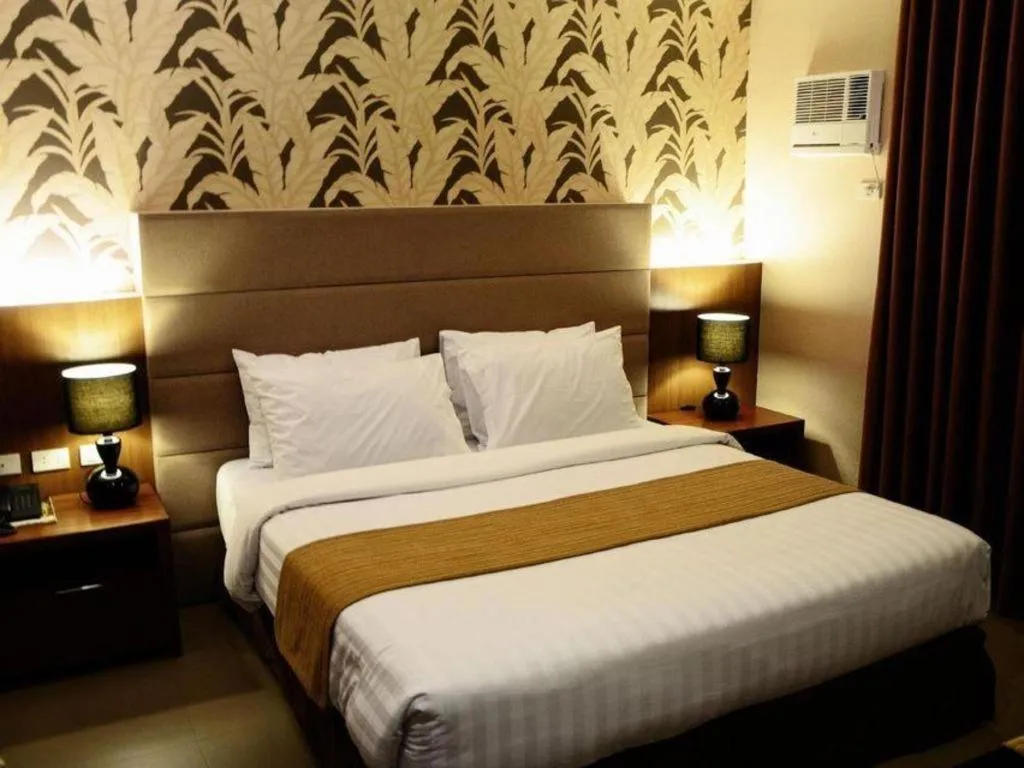 Bed in GT Hotel Bacolod
