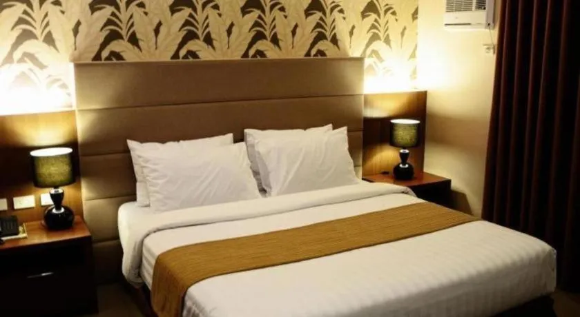 Bed in GT Hotel Bacolod
