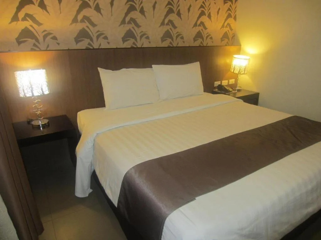 Bed in GT Hotel Bacolod