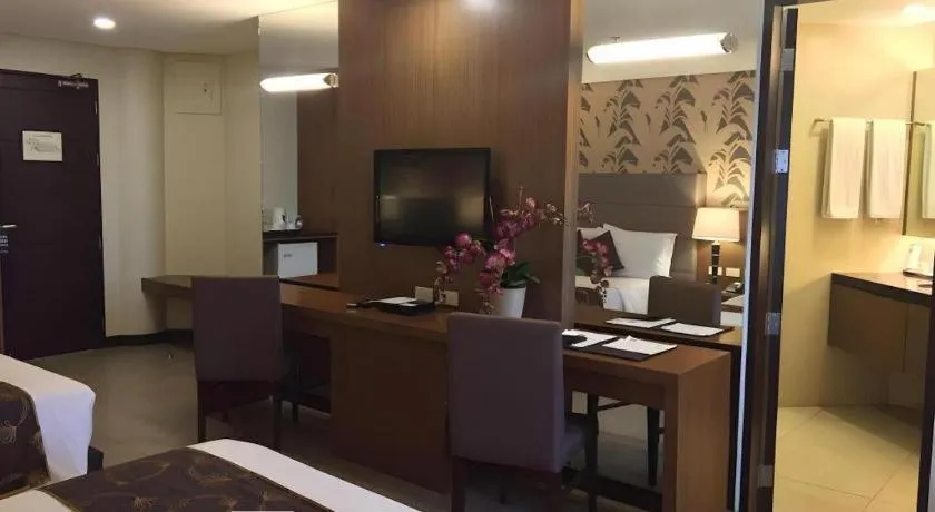 Bed in GT Hotel Bacolod