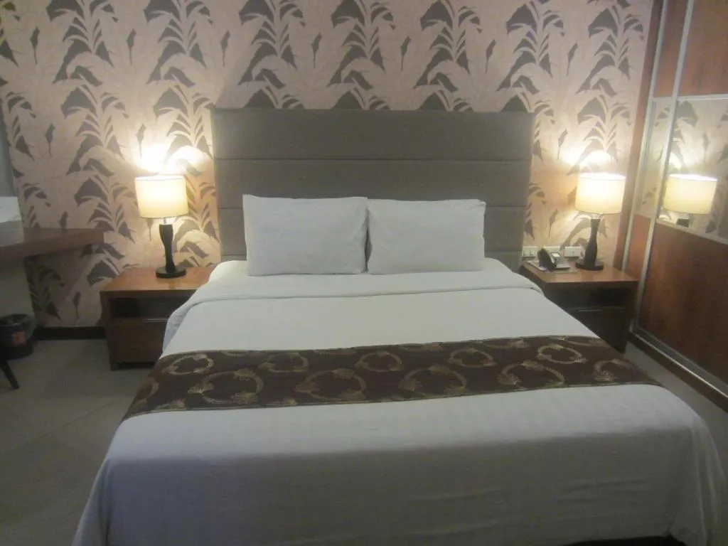 Bed in GT Hotel Bacolod