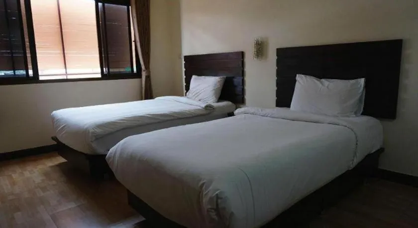 Bed in Ponburi Hotel