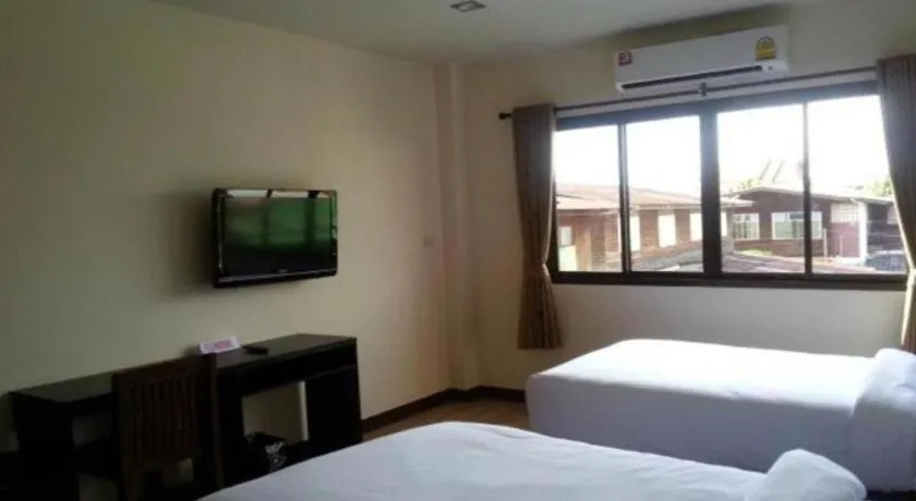 Bed in Ponburi Hotel
